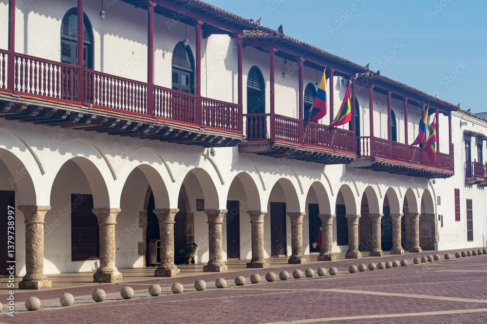 Fototapeta premium Colonial Architecture with Flags in Cartagena. Bolívar, Colombia, Showcasing Spanish Heritage