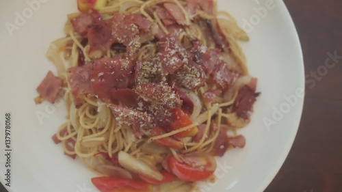 Plate of delicious spaghetti alla carbonara, a traditional recipe of pasta of roman cuisine, italian food, european gastronomy 