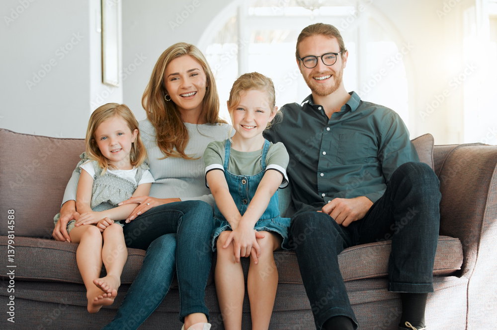 Love, portrait and smile with family on sofa in living room of home together to relax for support. Growth, relationship or together with happy mother, father and children in apartment for bonding Love, portrait and smile with family on sofa in living room of home together to relax for support. Growth, relationship or together with happy mother, father and children in apartment for bonding