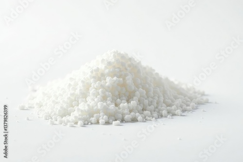 Crystalline sugar granules, bright white background, sweet, geometric