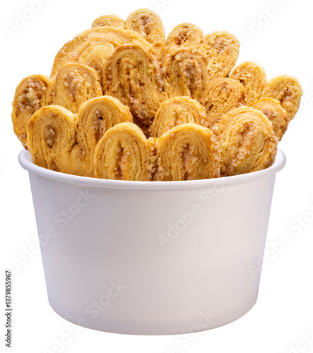 Obraz na płótnie Palmiers Recipe or Puff Pastry Dough in paper bucket isolated on white background, Butterfly Pie on white PNG File. w salonie