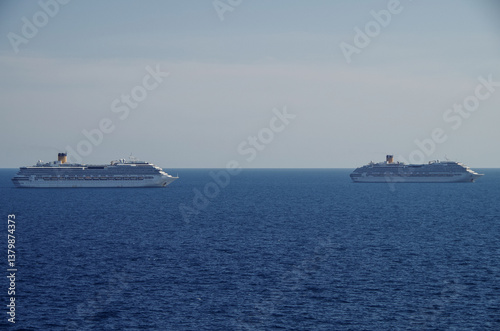 Obraz na płótnie Mega family cruiseship cruise ship liner Fortuna anchored offshore of Civitavecchia Rome, Italy before reactived after Covid pandemic with other vessels in port and coastline w salonie