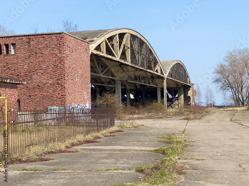 An old ruined aircraft hangar building.