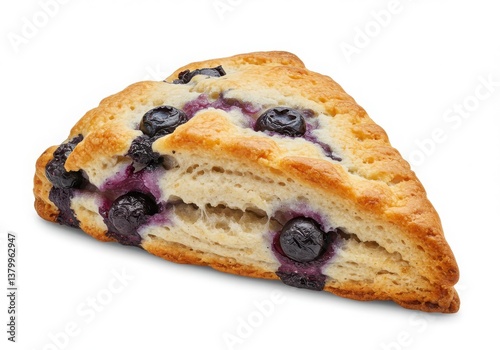 A single blueberry scone cut in a triangular shape isolated on a white background for food photography