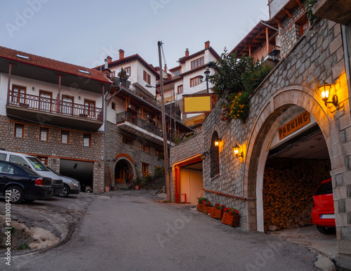 Fototapeta Naklejka Na Ścianę i Meble -  Streets and houses of traditional architecture in the mountain tourist village of Metsovo in the mountains of Epirus in Greece