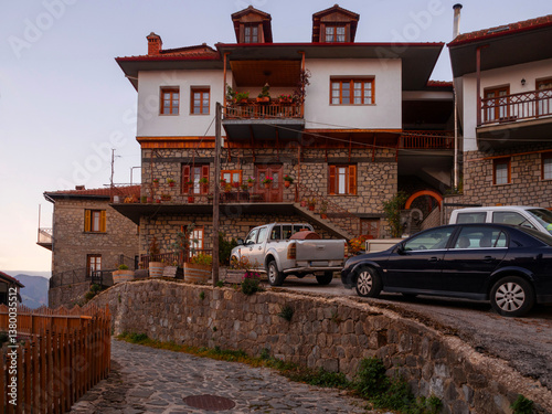 Fototapeta Naklejka Na Ścianę i Meble -  Streets and houses of traditional architecture in the mountain tourist village of Metsovo in the mountains of Epirus in Greece