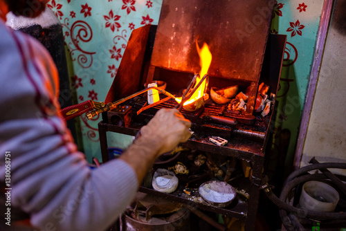 Craftsman making jewelry photo