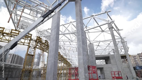 Modern Construction Site with Steel Framework and Concrete Columns