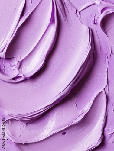 Vibrant purple paint on canvas background with splatters.