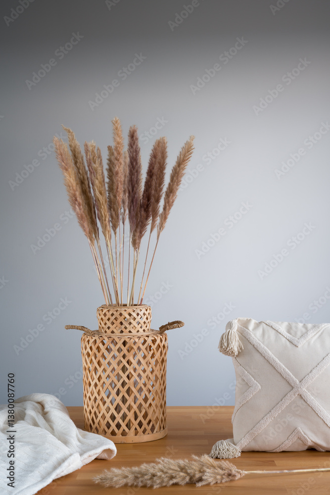 Bohemian Style: Pampas Grass, Woven Vase and Textured Pillow Still Life