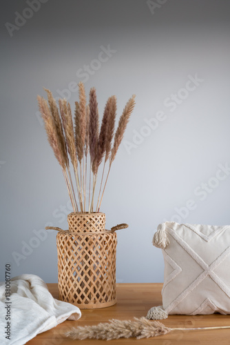 Obraz na płótnie Bohemian Style: Pampas Grass, Woven Vase and Textured Pillow Still Life w salonie