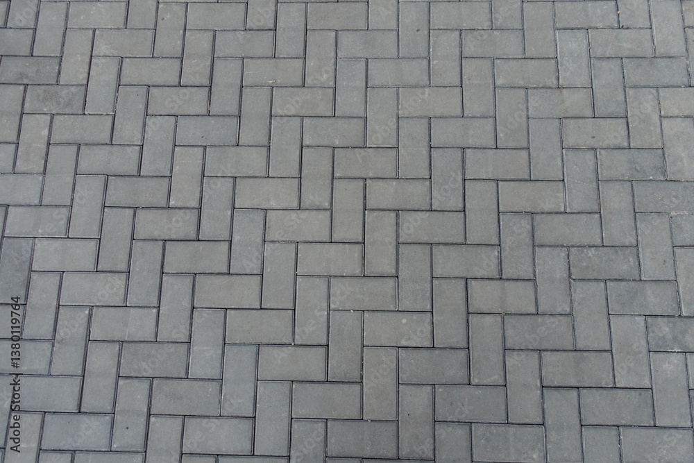 Backdrop - grey concrete pavement with single herringbone layout