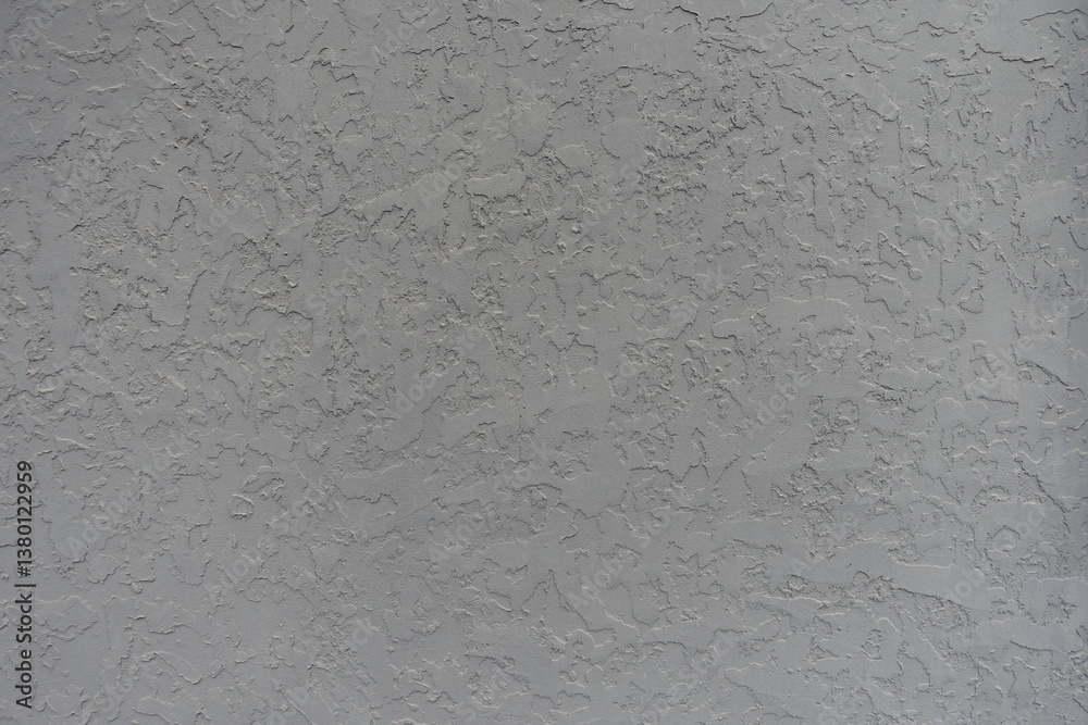 Background - gray wall with troweled dash stucco finish