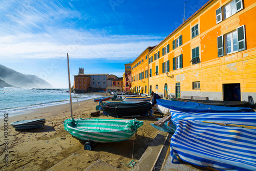 Fototapeta Naklejka Na Ścianę i Meble -  House and Boat on the Sand Beach in Sestri Levante, Liguria, Italy.