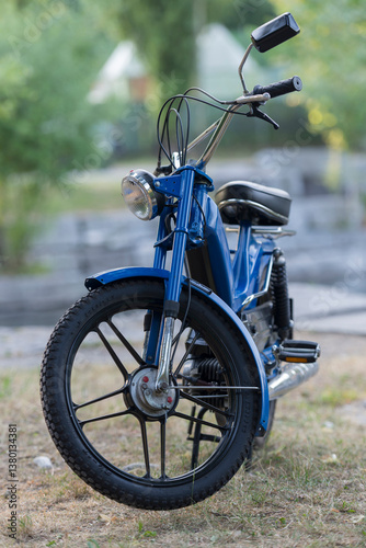 Beautiful Blue Moped Outdoors in Switzerland.