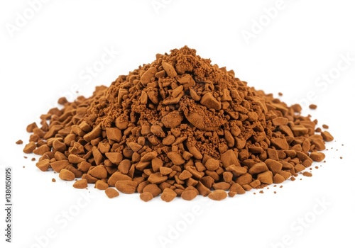 A pile of freeze dried instant coffee granules isolated on a white background in a studio shot