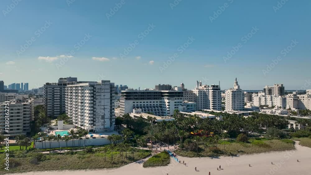 Aerial view of golden sands and soft waves at South Beach, with the Ritz-Carlton Aerial view of golden sands and soft waves at South Beach, with the Ritz-Carlton