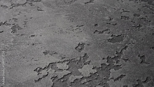 A beautifully textured dark surface with elegant patterns adds sophistication