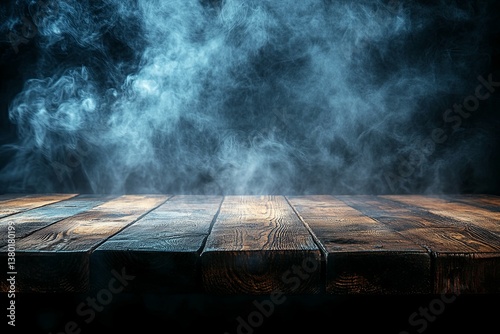 Wooden table with swirling smoke against a dark background
