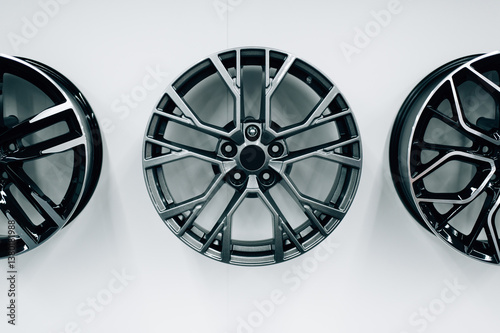 Car wheel rims hanging on the wall
