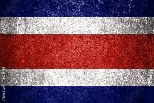 Costa Rica state flag on a metal surface. Dirty grunge Costa Rica flag.