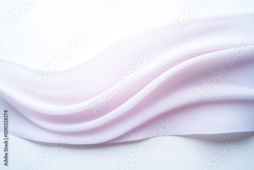 Soft lilac fabric gracefully drapes, creating gentle waves and s photo