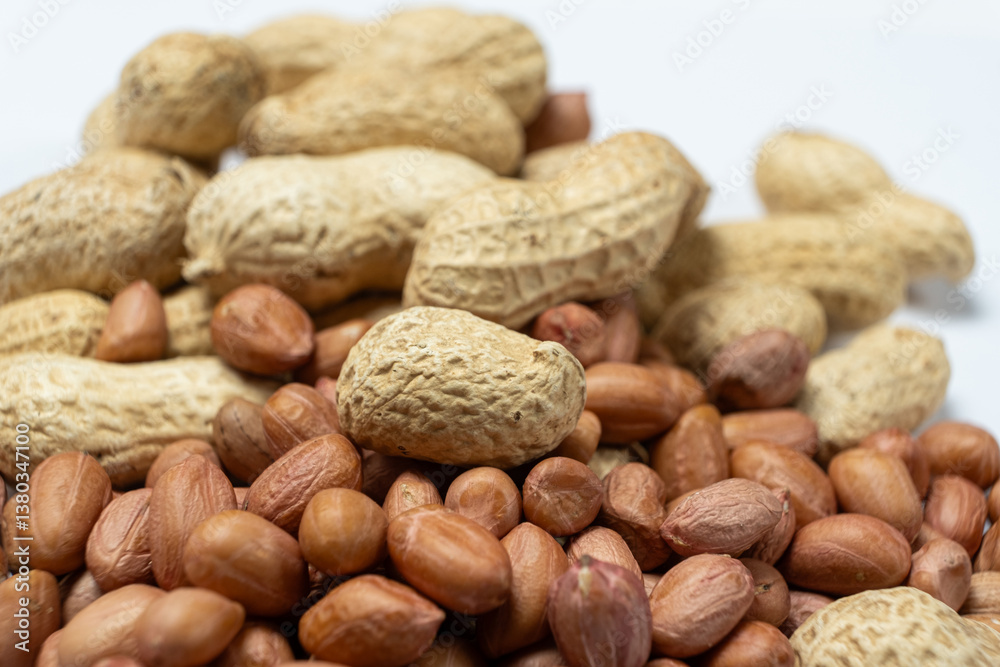 Shelled and Unshelled Peanuts Close-Up Shelled and Unshelled Peanuts Close-Up