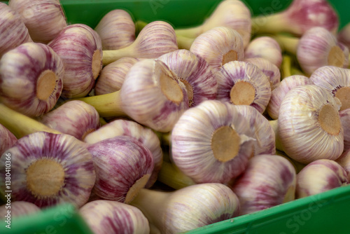 Fresh garlic displayed at a neighborhood market