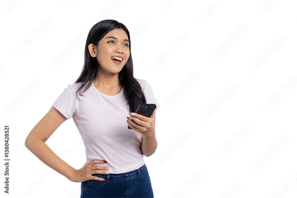 Happy young Asian woman smiling while holding smartphone, looking excited and cheerful, isolated on transparent background