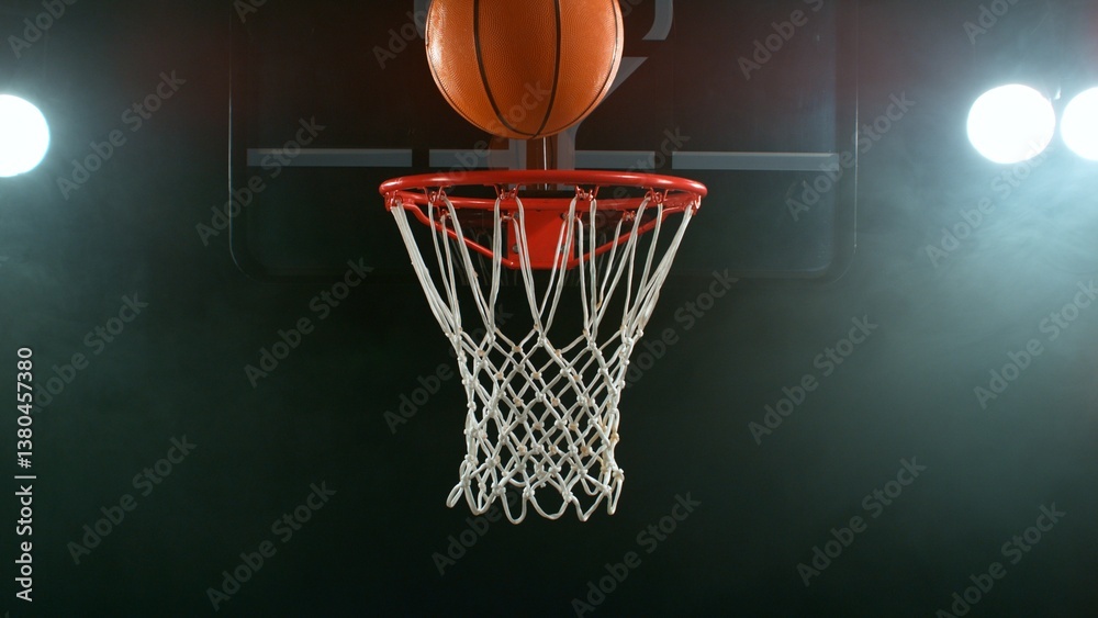 Freeze motion of basketball ball hitting the basket Freeze motion of basketball ball hitting the basket