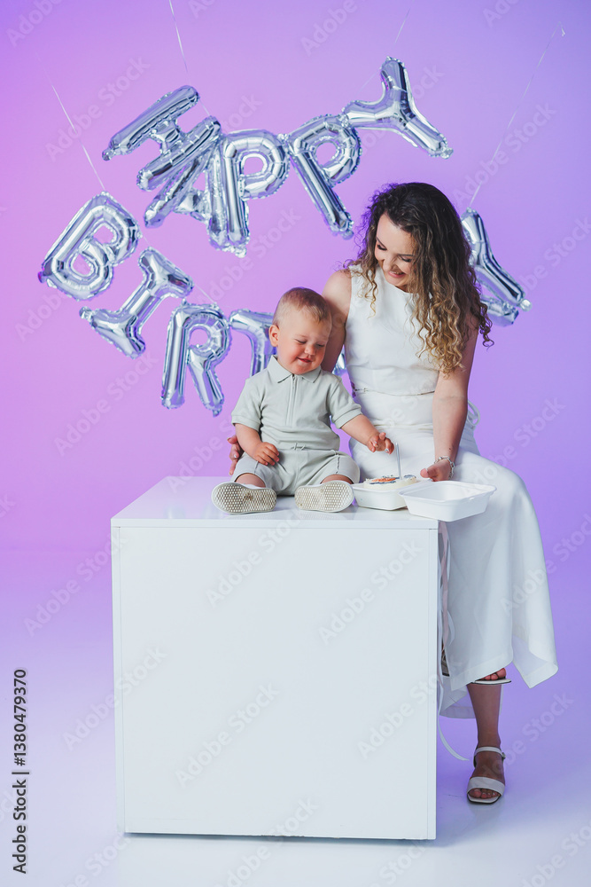 Celebrate a joyful birthday with happiness and love, featuring an adorable baby, a loving mother, and a beautifully decorated setting, all creating cherished memories and smiles for everyone