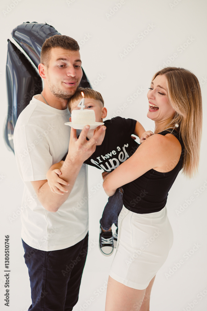 A Joyful Family Celebration Featuring a Beautiful Cake These Cherished Moments Have Been Captured Perfectly in a Fun and Playful Setting, Bringing Together All Loved Ones to Celebrate