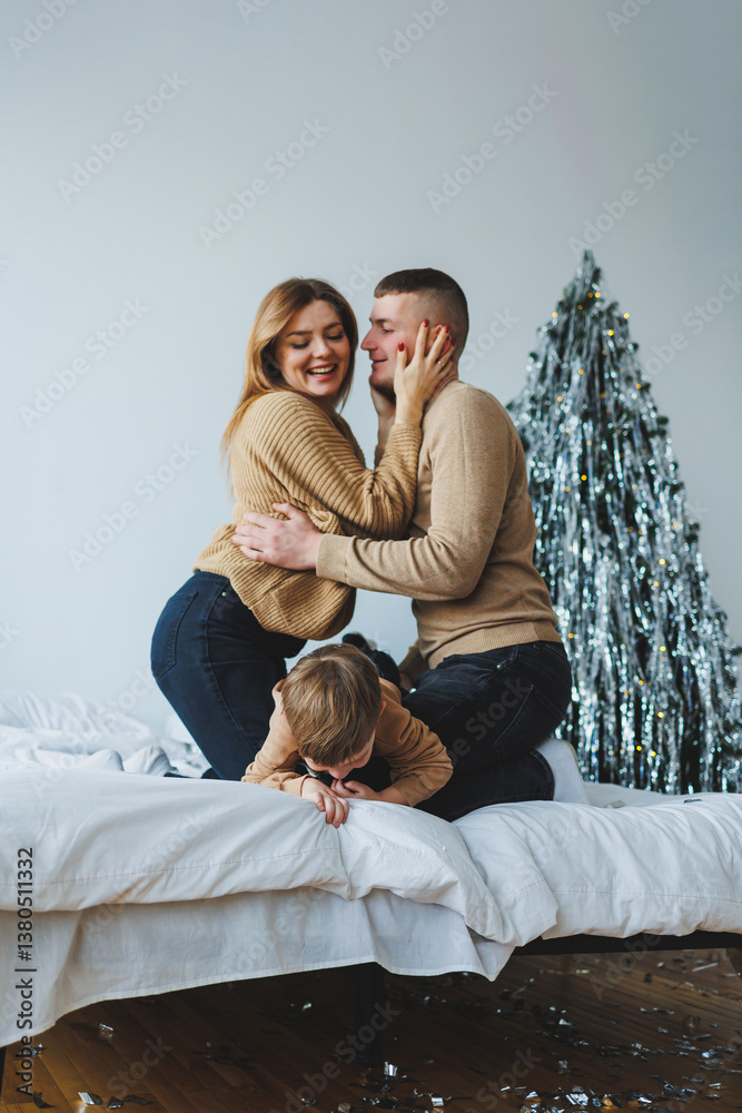 Cozy Family Moments Experience the joy of family playtime set in a beautifully festive atmosphere filled with glittering decorations that enhance the warmth and togetherness of the occasion