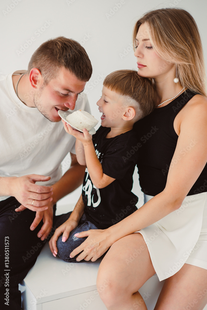 A Heartwarming Family Bonding Moment Captured Delightful and Playful Interaction Between Loving Parents and Their Joyful Child in a Bright, Modern Setting Full of Warmth and Positivity