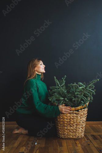 Obraz na płótnie Embracing Nature A Serene Portrait of a Woman Forming a Deep Connection with Indoor Plants in a Cozy, Rustic Setting, Highlighting the Joy and Peacefulness of Gardening and Greenery in her Life w salonie