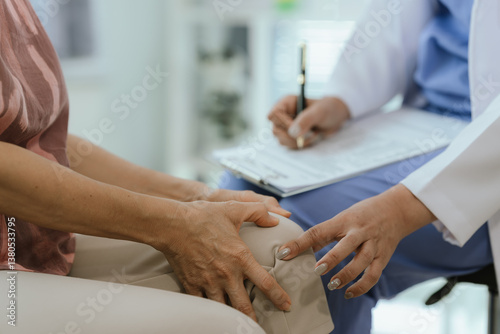 Wallpaper Mural Doctors examine an elderly patient who is suffering from knee pain due to arthritis. The patient is being assisted in his recovery, with an emphasis on pain management and improving mobility. Torontodigital.ca