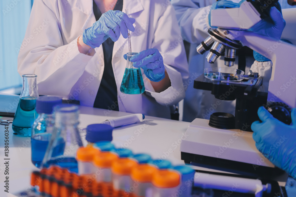 Fototapeta premium Chemists in a lab developing cosmetic products, testing and analyzing formulas for quality and effectiveness.