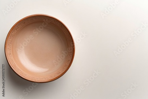 Simple round dish with soft colors, showcasing minimalist design