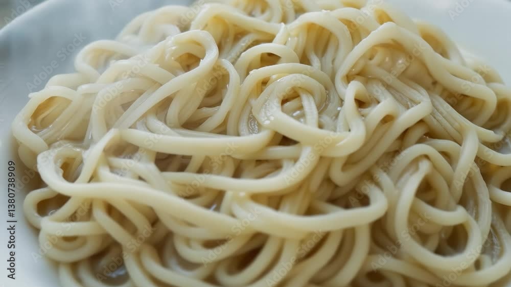 Overhead montage of delicious udon noodles in broth