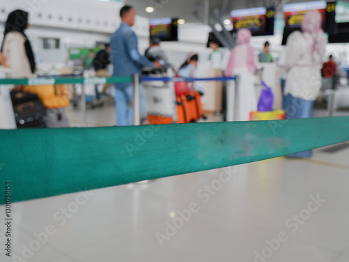 check in queue line tape at the airport airplane. selective focus