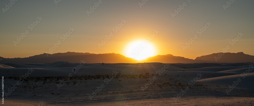 White Sands National Park A desert landscape with a sun in the sky