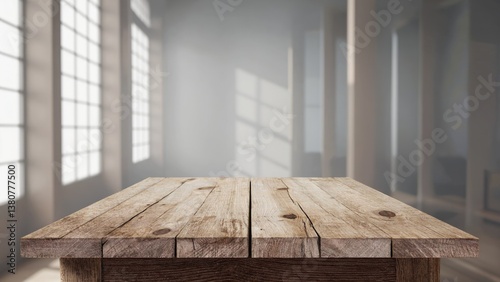 A simple wooden table in front of a window with natural light pouring in
