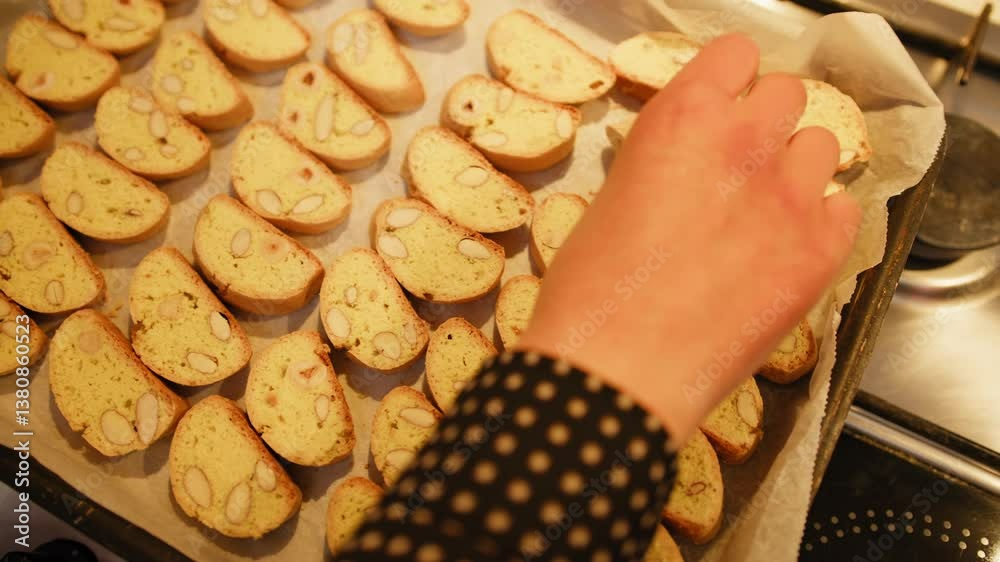 Woman Hands Turn Homemade Cantucci Biscuits In The Oven