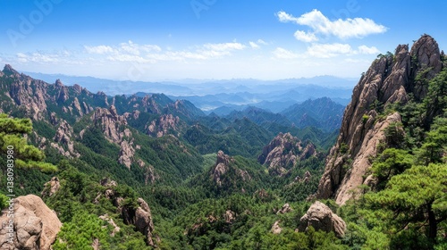 Panoramic mountain range vista. Lush green valleys nestled between rugged peaks photo