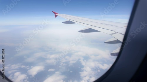 Flight adventure over clouds air travel aerial view blue sky wide angle journey of discovery