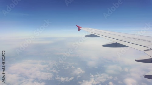 Flight adventure over clouds air travel aerial view blue sky wide angle journey of discovery