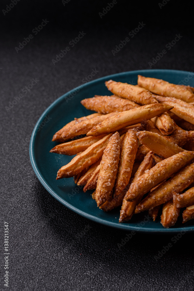 Cinnamon flavored biscuits or breadsticks Cinnamon flavored biscuits or breadsticks