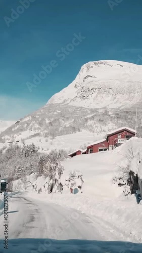 Vertical view of Norway road from car