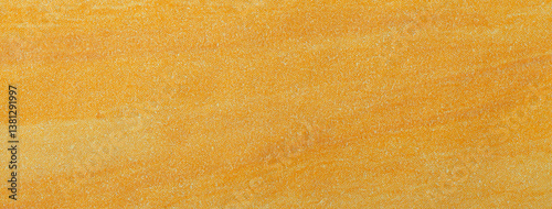 Abstract art background dark yellow and golden colors. Watercolor painting with soft ocher gradient.