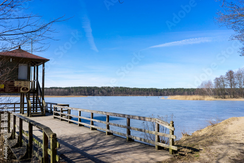 Melting ice on a forest lake